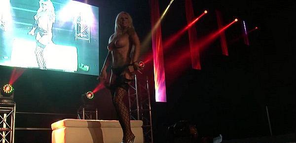 busty milf stripping on public stage